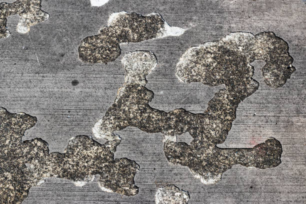 istock Worn concrete pavement on a public sidewalk 1150370948