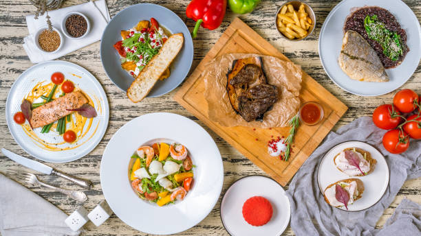 istock Assorted European dishes salmon, Dorado, meat, salads 1150371406