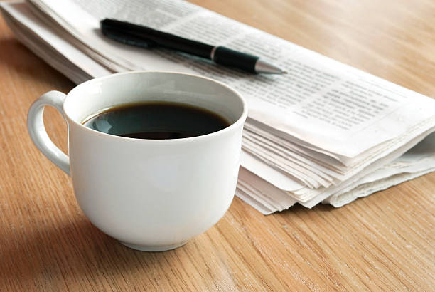 istock Morning coffee and newspaper. 115037214