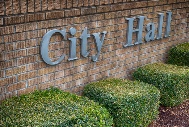istock City Hall sign on a brick wall 1150372398