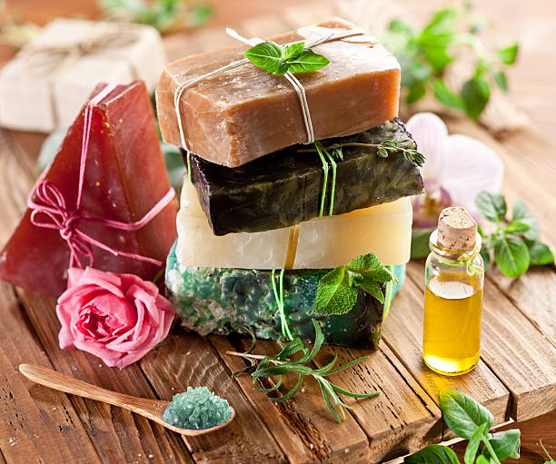 Pieces of natural soap. Piece of natural soap with herbs and flowers. homemade stock pictures, royalty-free photos & images