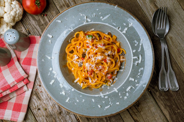 istock Spaghetti with vegetables in tomato sauce 1150373971