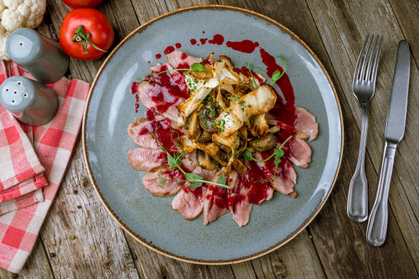 istock Duck breast with berry sauce 1150374534