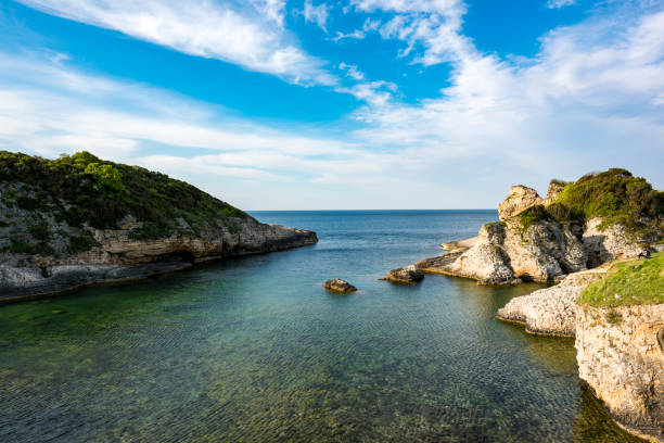 istock Rocky seashore at sunset. Beautiful nature with dramatic sky. 1150375862