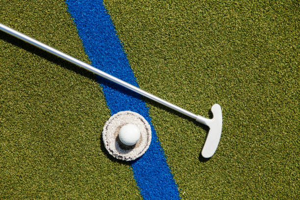 istock Golf club and ball in grass 1150376050