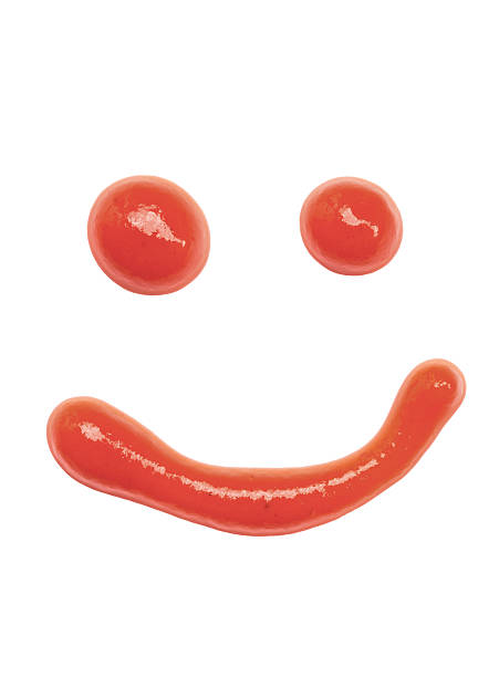ketchup smile emoticon, isolated on white stock photo