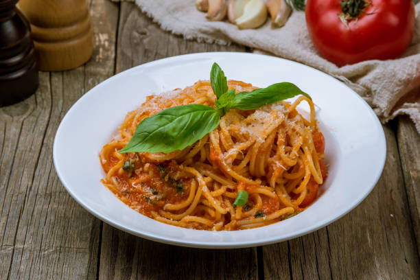 istock Spaghetti with vegetables in tomato sauce 1150382240