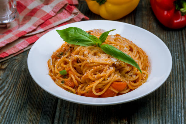 istock Spaghetti with vegetables in tomato sauce 1150382278