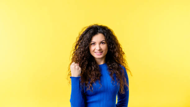 istock delighted winner successful emotional girl 1150384843