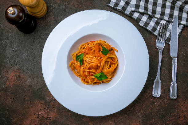 istock Spaghetti with vegetables in tomato sauce 1150386784