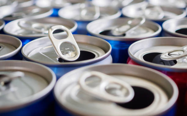 istock Empty aluminium drink cans recycling background concept 1150390043