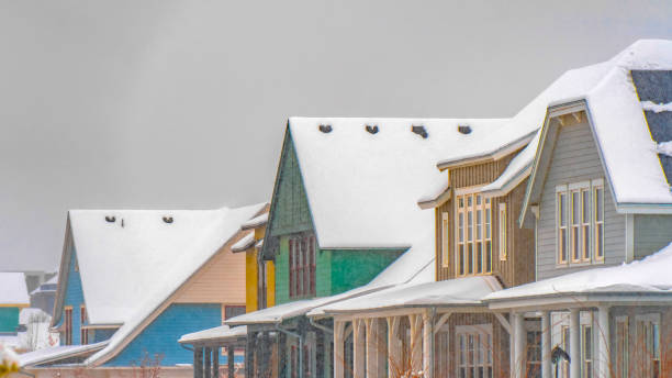 istock Clear Panorama Snow topped homes in Daybreak during winter 1150392260
