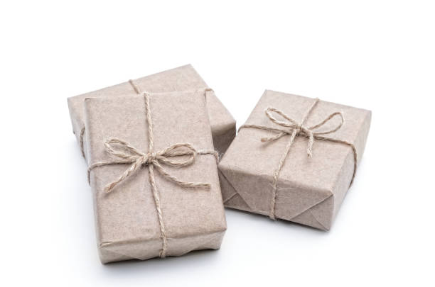 istock Boxes wrapped in wrapping paper on a white background 1150392373