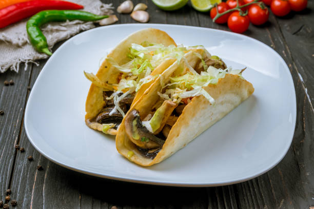 istock Mexican tacos with vegetables vegetarian 1150393035