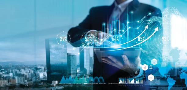 istock Digital marketing. Business strategy. Businessman using tablet analyzing sales data and economic growth graph chart on hologram screen. Business strategy and digital data. 1150397416