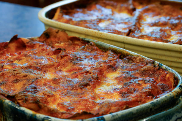 istock Two Lasagnas cooling in stoneware dishes 1150404061