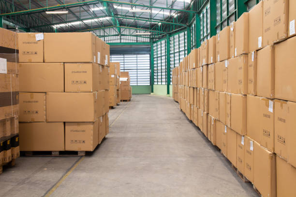 istock The rows of material boxes or product boxes in warehouse area. 1150404196