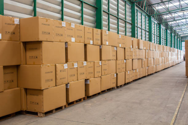 istock The rows of material boxes or product boxes in warehouse area. 1150404197