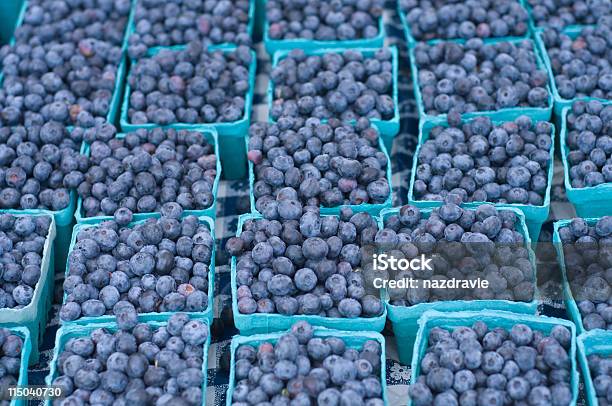 Groups Of Blueberries In Multiple Small Baskets On A Table Stock Photo - Download Image Now