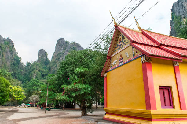 istock Thai temple beside the mountain 1150411836