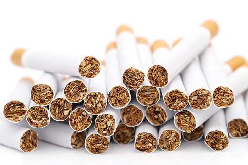 close up of cigarettes isolated on white background