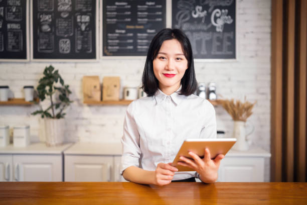 istock Confident female coffee shop owner 1150419028