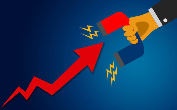 istock Hand holding magnet to change arrow direction 1150419817