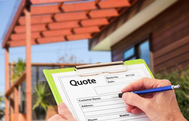 Hand Writing a quote for Home Building Renovation stock photo