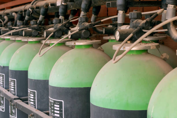 istock Green argon gas cylinders with pressure gauges 1150425639