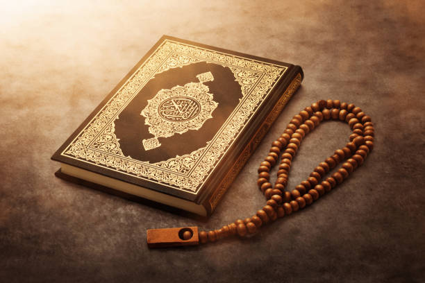 istock Quran holy book with prayer beads beads 1150428816