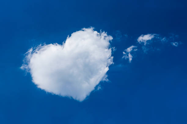istock blue sky and heart-shaped cloud 1150429648
