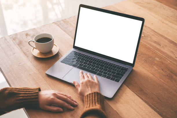 istock a woman's hand using and touching on laptop touchpad with blank white desktop screen 1150430833