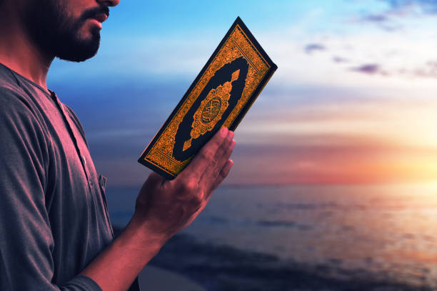 istock Muslim man reading holy quran 1150431113