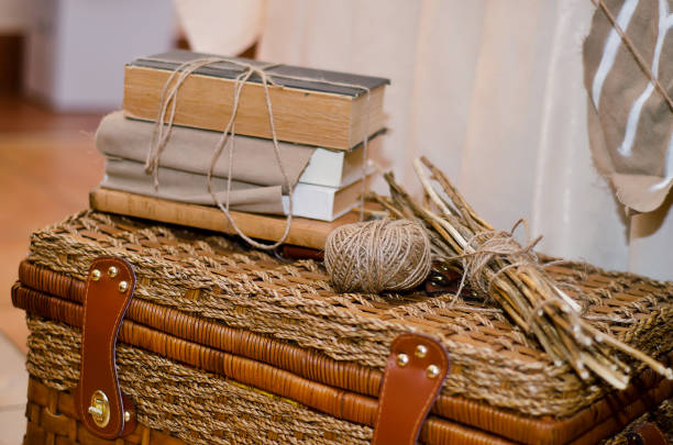 istock Composition with a picnic basket, books, threads in a rustic style 1150431816