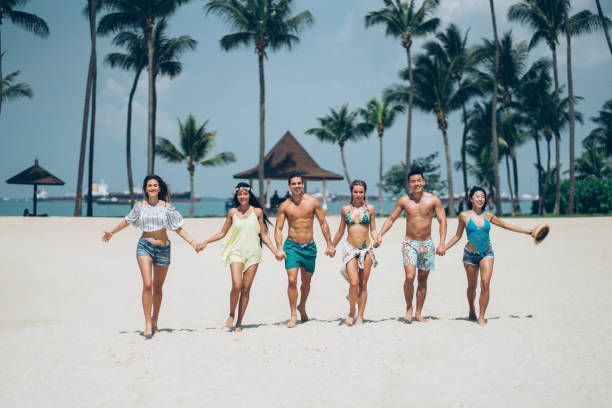 istock Friends on the beach 1150434758