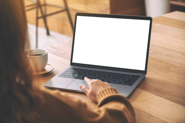 istock a woman's hand using and touching on laptop touchpad with blank white desktop screen 1150435080