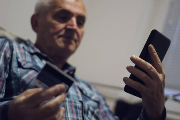 istock Senior shopping online 1150440775