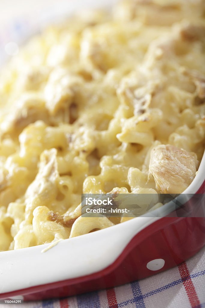 Macaroni and cheese with chicken Macaroni and cheese with chicken meat in the baking dish. Shallow DOF Chicken Meat Stock Photo