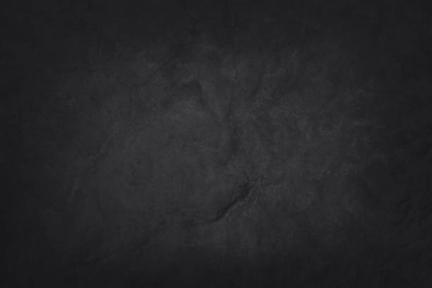 istock Dark grey black slate texture with high resolution, background of natural black stone wall. 1150453791