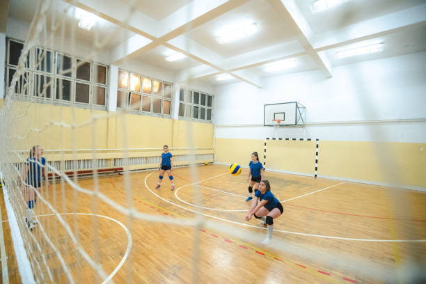 istock Female volleyball player digs 1150455250