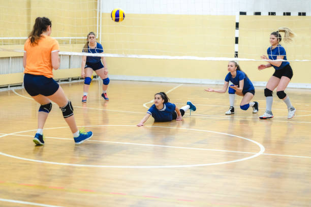 istock Female volleyball player digs 1150455472