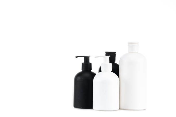 istock Black and white cosmetic bottles isolated on white 1150455912
