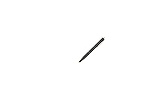 A quill pen made with a swan feather and an ink pod on black background