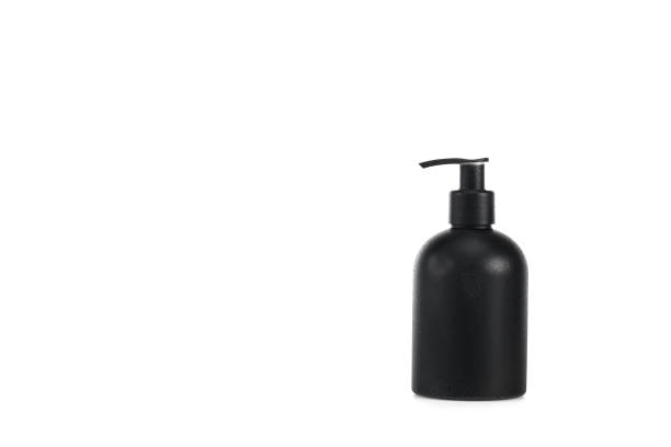 istock Black cosmetic bottle with spray isolated on white 1150456650
