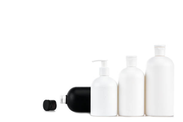 istock Black and white cosmetic bottles isolated on white 1150456667
