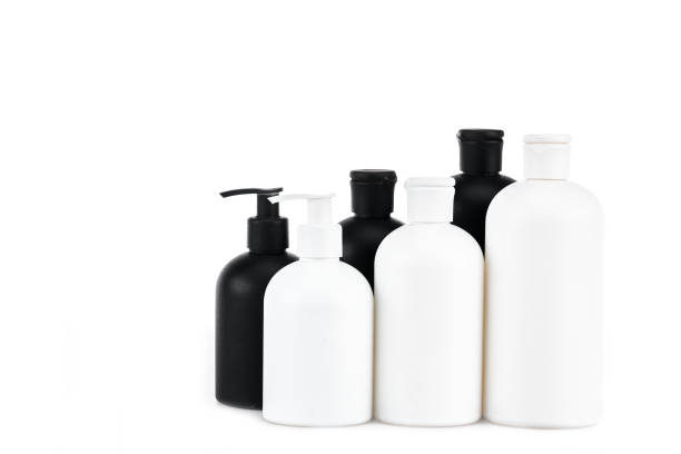 istock Black and white cosmetic bottles isolated on white 1150456674