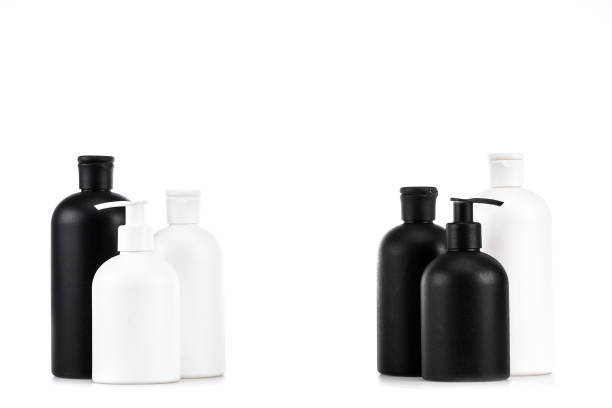 istock Black and white cosmetic bottles isolated on white 1150456676