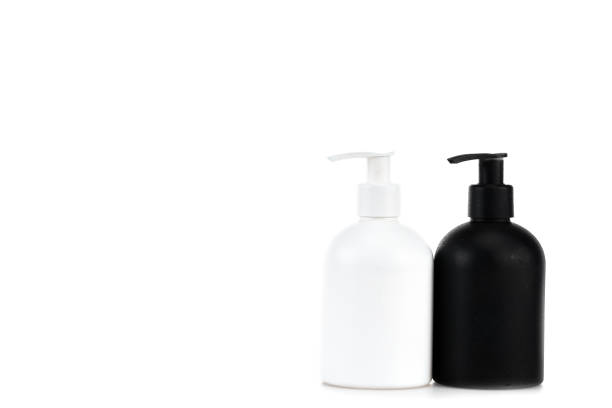 istock Black and white cosmetic spray bottles isolated on white 1150456680