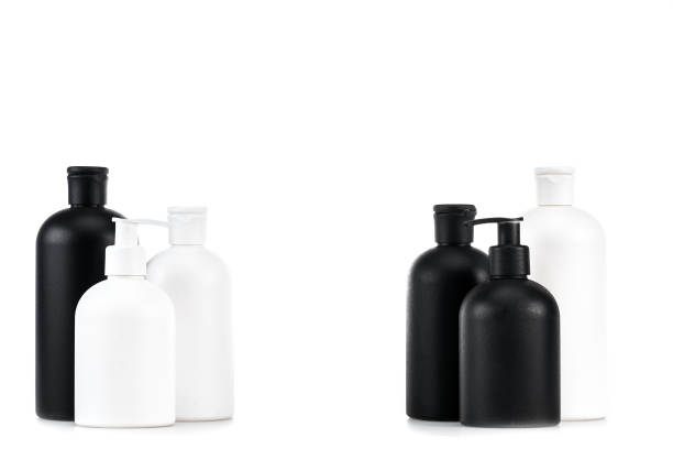 istock Black and white cosmetic bottles isolated on white 1150456685