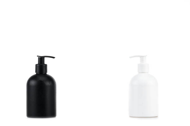 istock Black and white cosmetic bottles isolated on white 1150456689